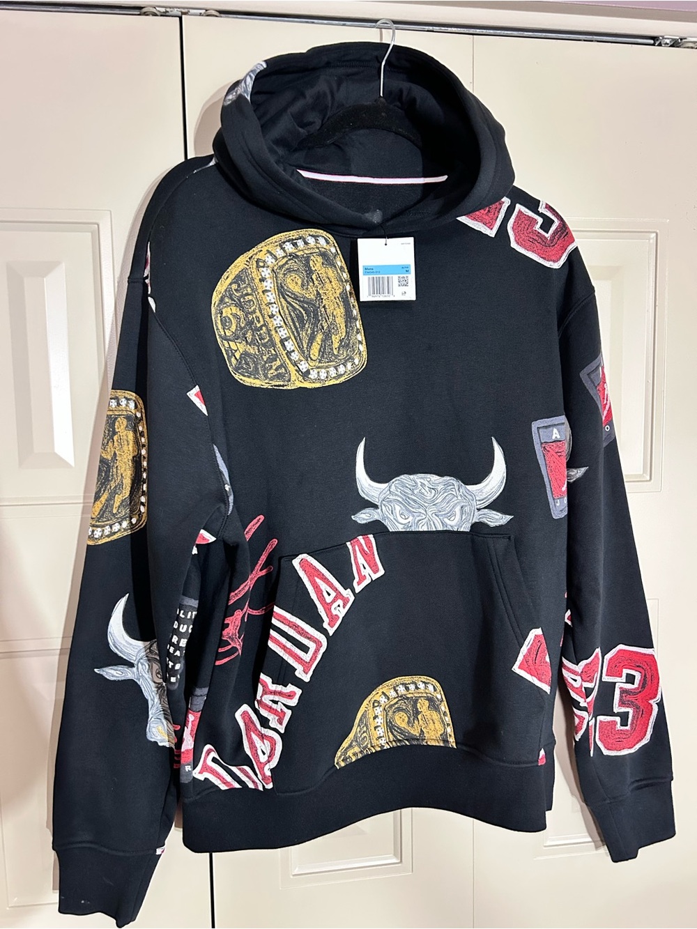 Jordan Black Hoodie with Gold and Red Graphic Accents